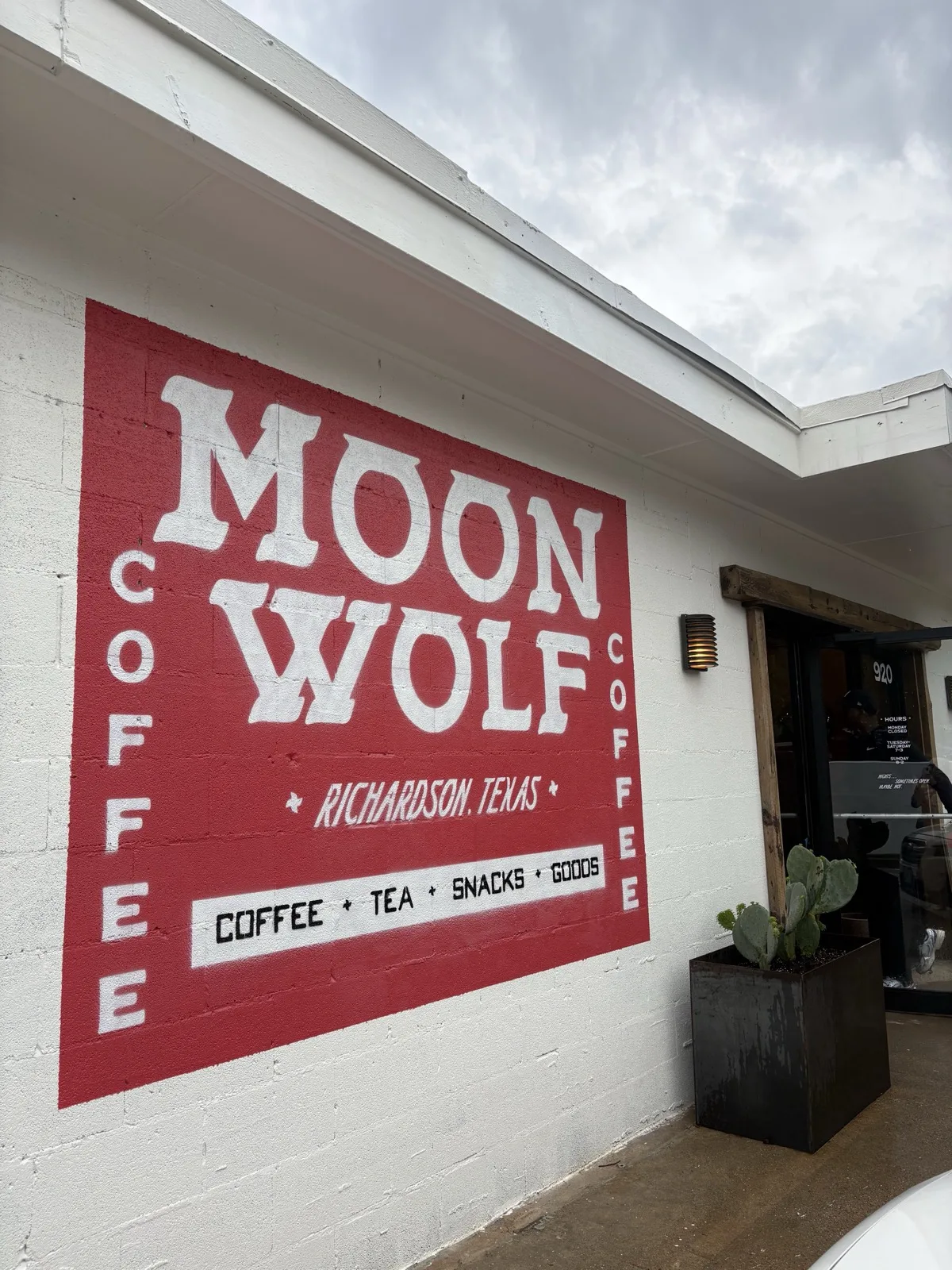 Chelsea Osborn — Moon Wolf storefront with hand-painted MOON WOLF mural